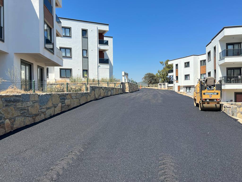 ASPHALT PAVING WORKS ON 8233 STREET IN MUMCULAR NEIGHBORHOOD COMPLETED