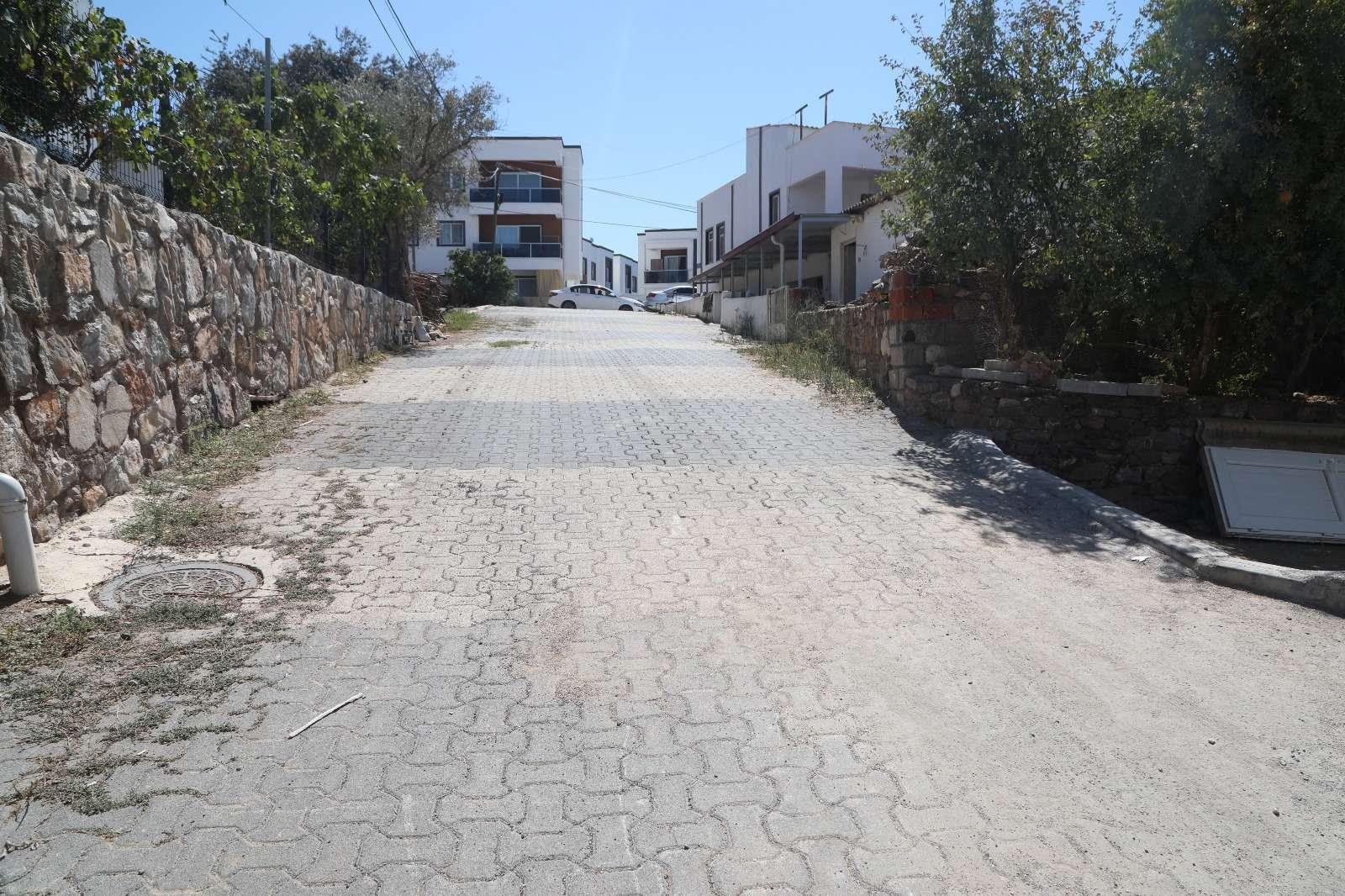 MUMCULAR NEIGHBORHOOD 8287 STREET PAVING WORKS COMPLETED