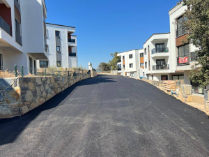 ASPHALT PAVING WORKS ON 8233 STREET IN MUMCULAR NEIGHBORHOOD COMPLETED