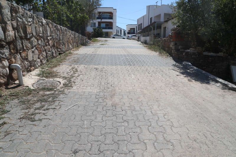 MUMCULAR NEIGHBORHOOD 8287 STREET PAVING WORKS COMPLETED
