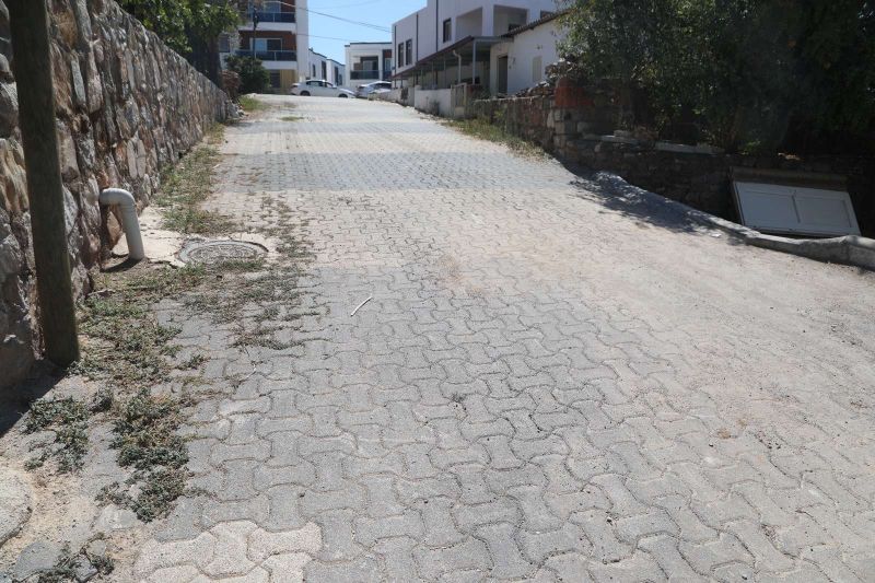MUMCULAR NEIGHBORHOOD 8287 STREET PAVING WORKS COMPLETED