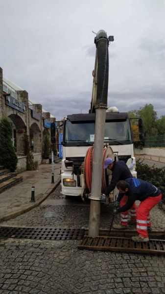 MANHOLE & RAINWATER CHANNEL IMPROVEMENTS