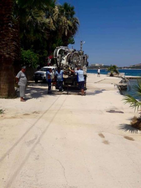 CLEANING, PRUNING & IRRIGATION OF RAINWATER DRAINAGE SYSTEMS IN MANY NEIGHBORHOODS